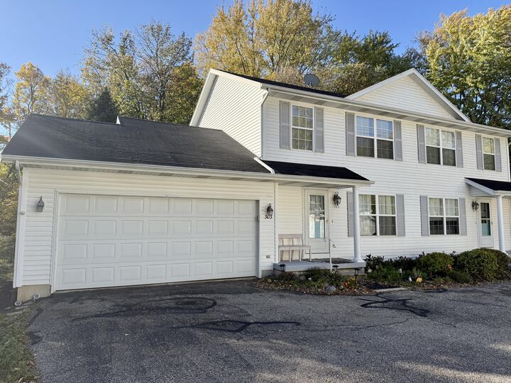 Property Photo:  303 W Wiley Road  MI 49406 