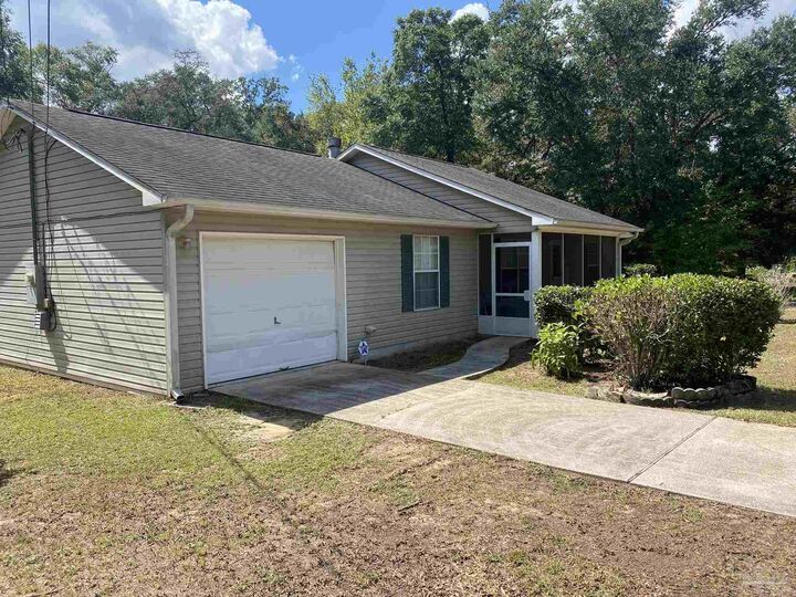 Property Photo:  6333 Rice St  FL 32583 