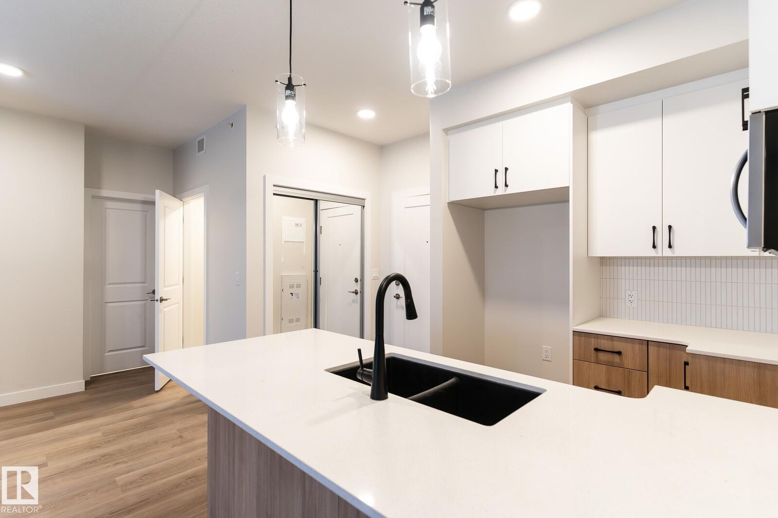 Property Photo: 2225 44 Avenue NW 210 AB T6T 0W5