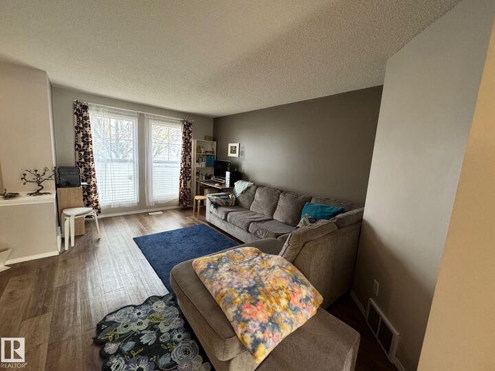 Property Photo:  20235 56 Avenue NW  AB T6M 0B3 