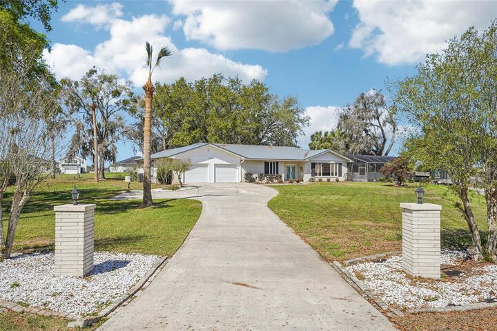 Property Photo:  33651 Overton Drive  FL 34788 