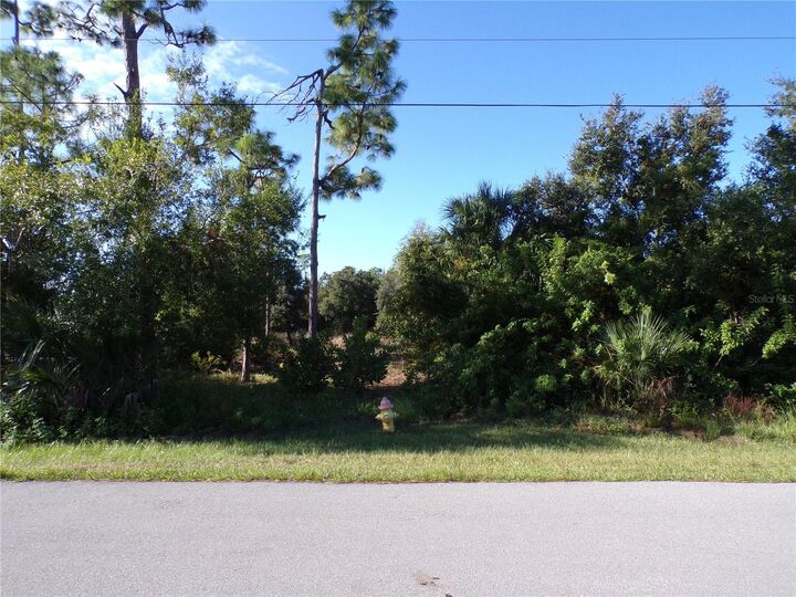 Property Photo:  25079 Harborside Boulevard  FL 33955