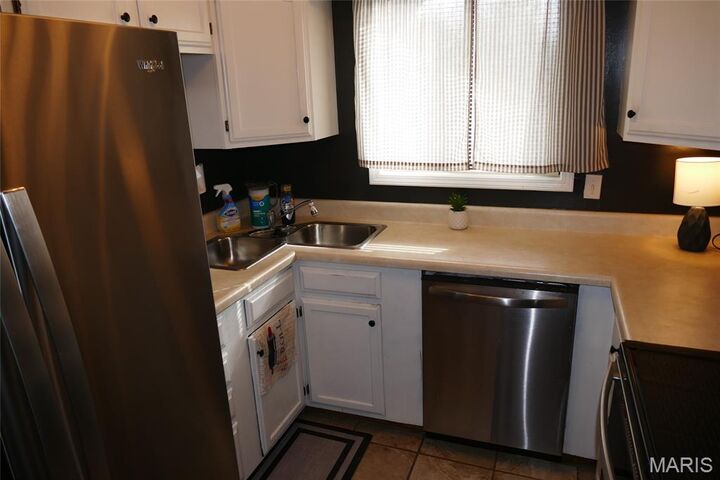 Property Photo:  5100 Hollow Wood Court D  MO 63128 