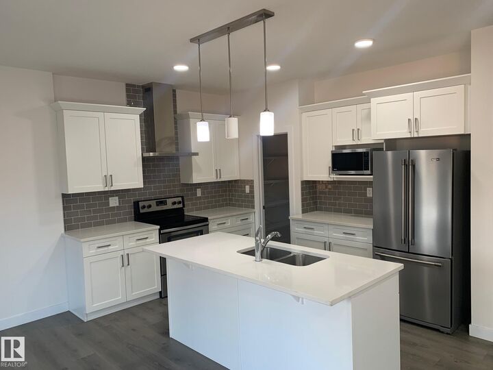 Property Photo:  370 Edgemont Road NW  AB T6M 0Y4 