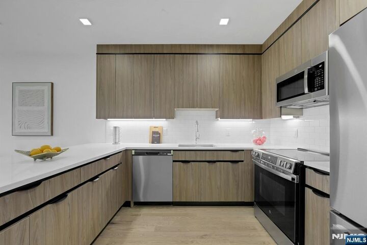 Property Photo:  8404 4th Avenue 410  NJ 07047 