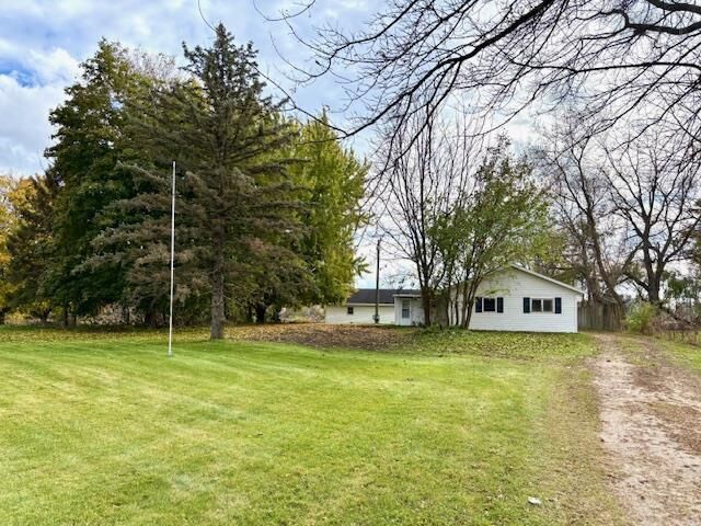 Property Photo:  W3869 State Road 106  WI 53538 