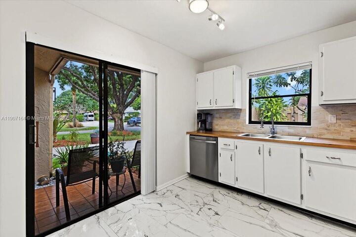 Property Photo: 901 NW 26th Ave FL 33445