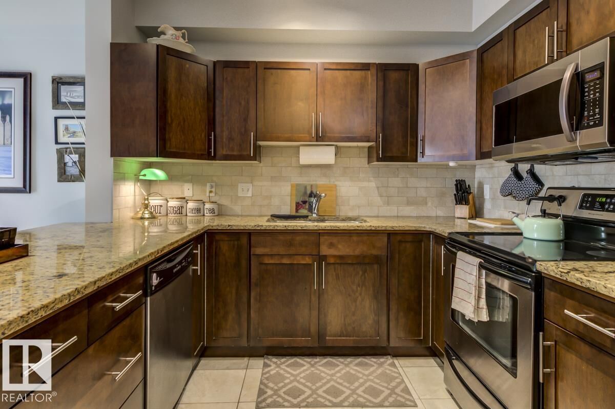 Property Photo: 2035 Grantham Court NW 322 AB T5T 3X4