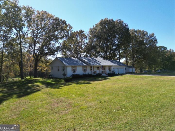 Property Photo:  2053 Buttermilk Road SW  GA 30124 