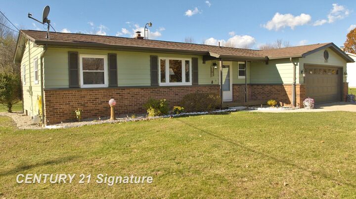 Property Photo: 11107 N Elms Road MI 48420
