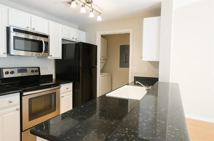 Property Photo: 350 Emerald Forest Boulevard 4202 LA 70433