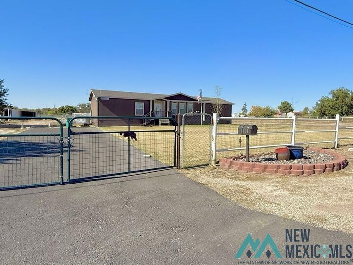 Property Photo: 1411 Tokay Avenue NM 88220