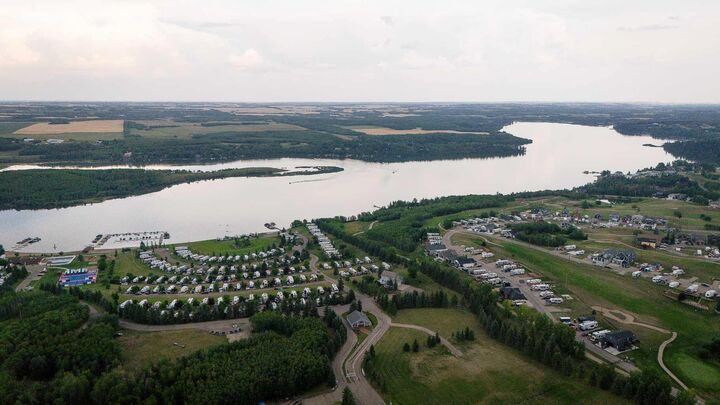 Property Photo:  25054 South Pine Lake Road 6122  AB T0M 1R0 