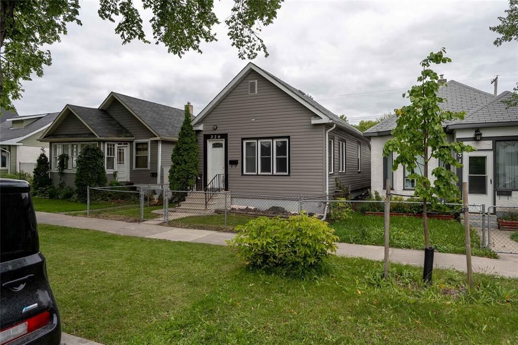 Property Photo:  329 Victoria Avenue East  MB R2C 0E6 
