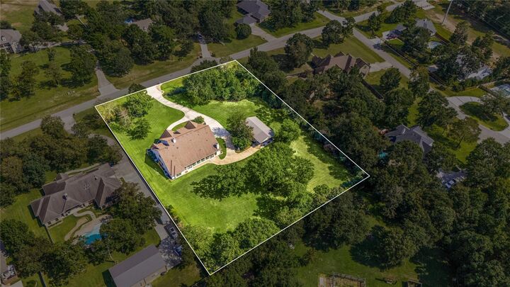 Property Photo:  8989 Stone Oak Drive  TX 77316 