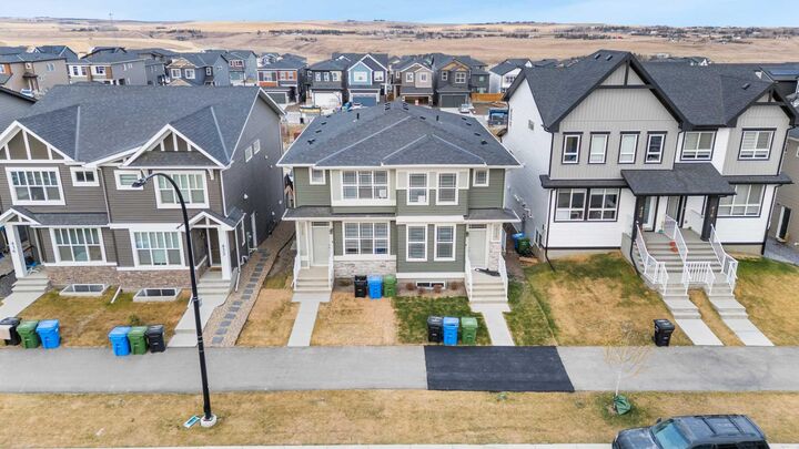 Property Photo: 428 Tekarra Drive NW AB T3R 2E9