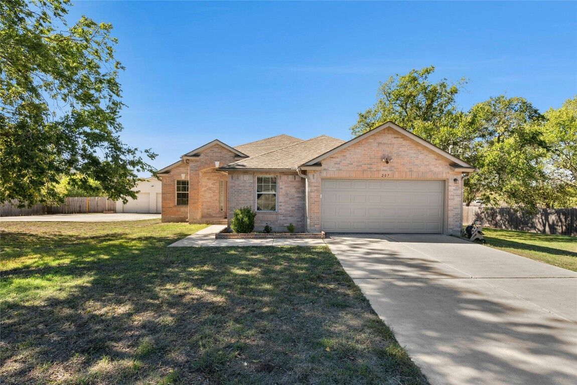 Property Photo:  207 Calle Largo  TX 78640 