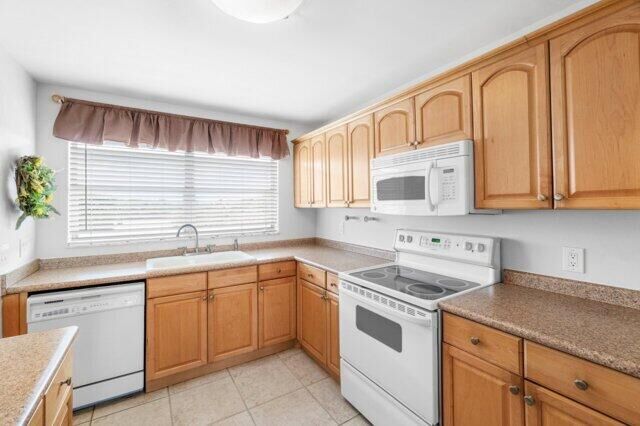 Property Photo:  2016 S Federal Highway E408  FL 33435 