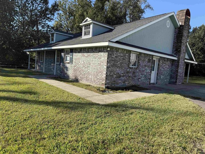 Property Photo:  215 Gilmer  TX 77611 