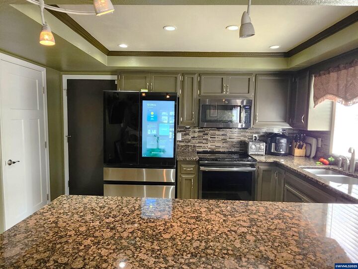 Property Photo:  1387 Windsong Ct NW  OR 97304 