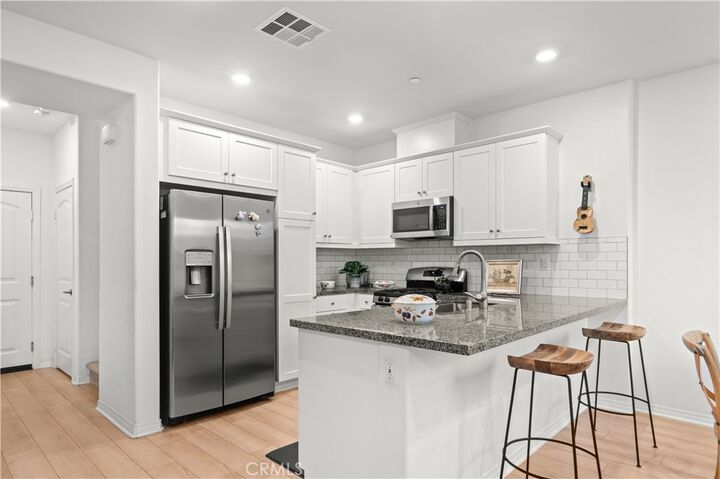 Property Photo:  16502 Casa Grande 105  CA 92336 