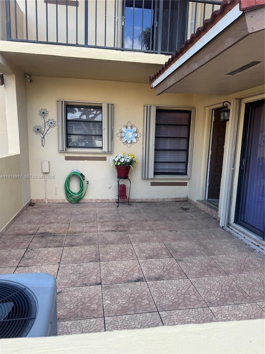 Property Photo:  6395 SW 136th Ct 110K  FL 33183 