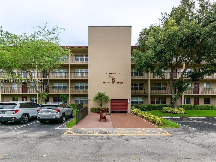 Property Photo:  850 SW 133rd Ter 206B  FL 33027 