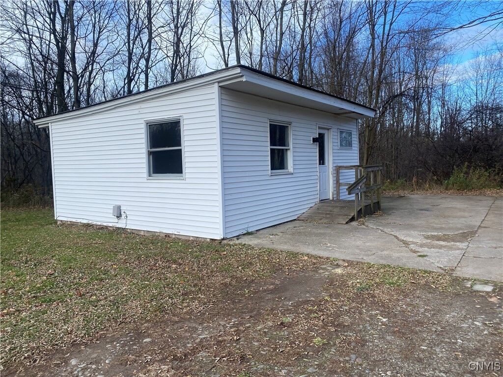 Property Photo: 660 County Route 1 5 Cottage NY 13126