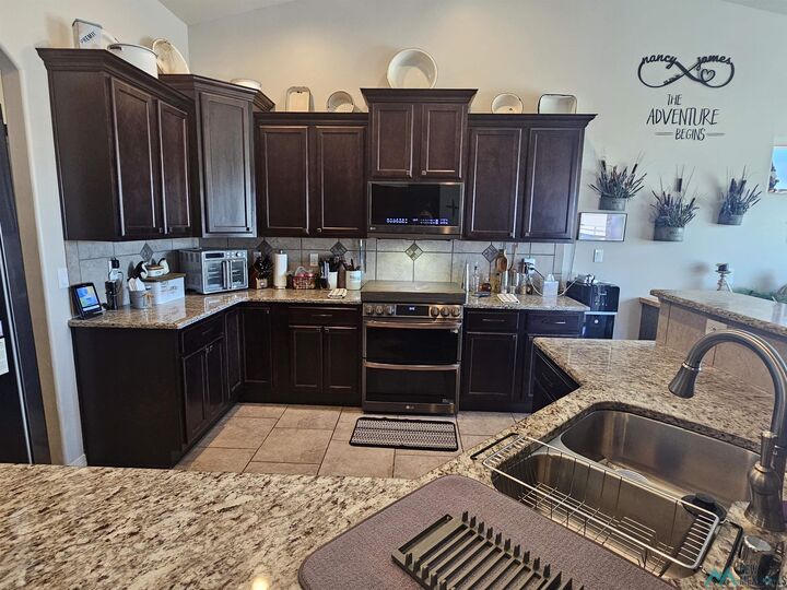 Property Photo:  823 Calamity Jane Drive  NM 88220-3068 