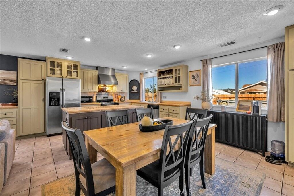 Property Photo:  7429 Maude Adams  CA 92277 
