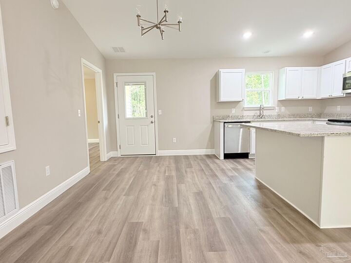 Property Photo: 7236 Par Ln FL 32570