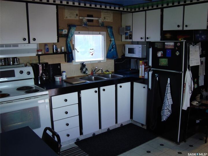 Property Photo: 701 11th Avenue NW 14 SK S9H 4M5