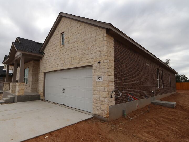 Property Photo:  374 Bishop Wood Road  TX 78620 
