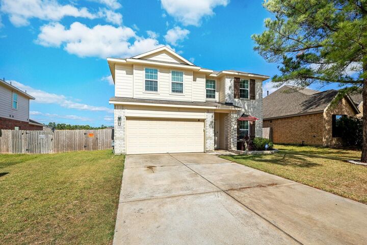 Property Photo: 18598 Legend Oaks Drive TX 77355