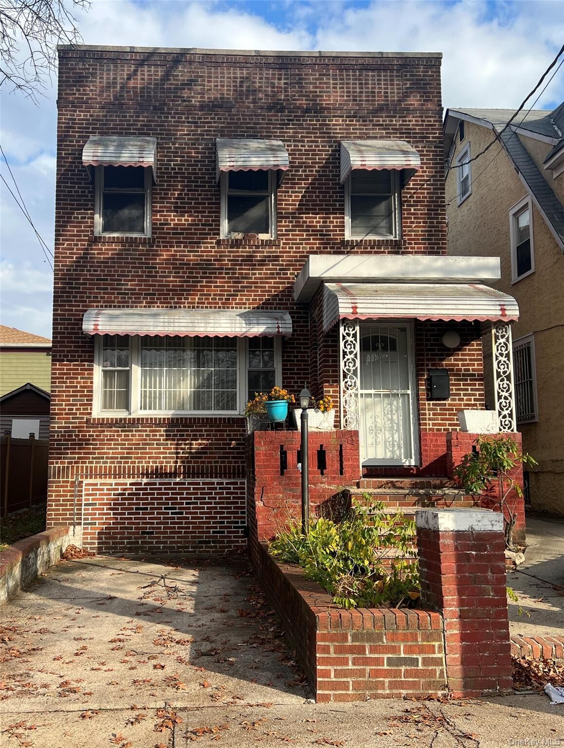 Property Photo:  104-09 201 Street  NY 11412 