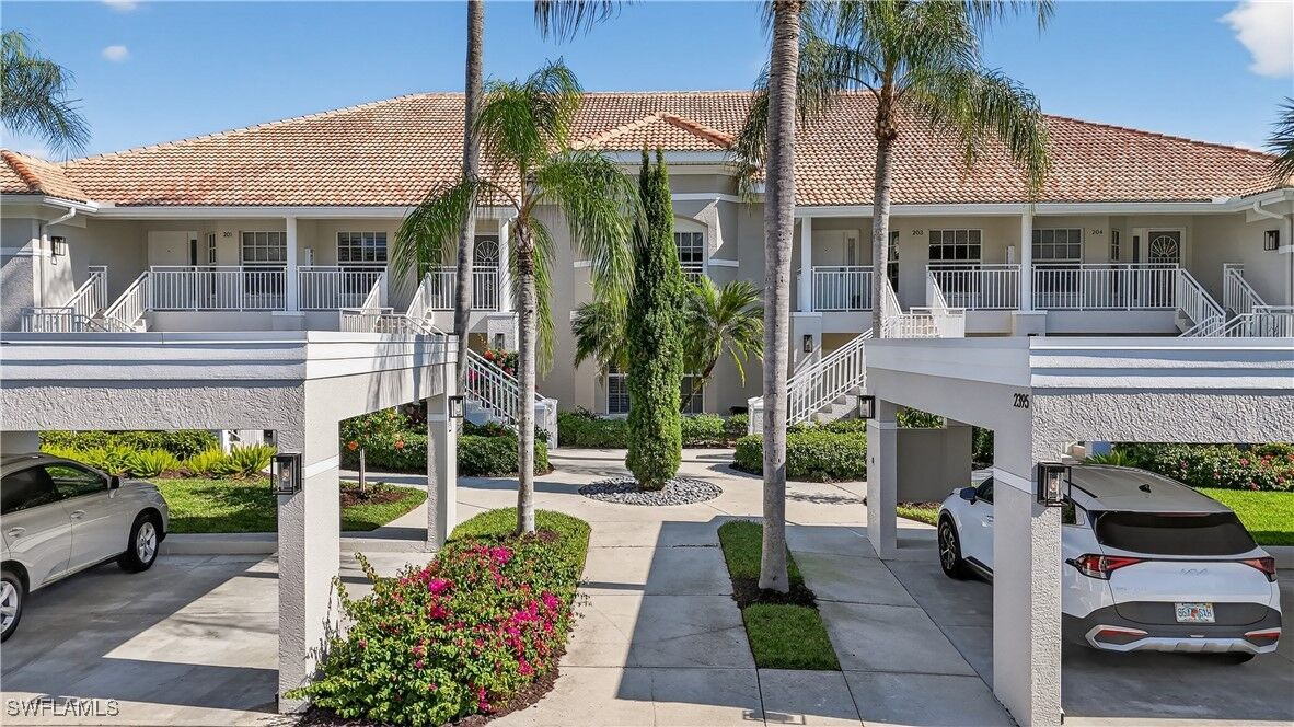 Property Photo: 2395 Harmony Lane 203 FL 34109