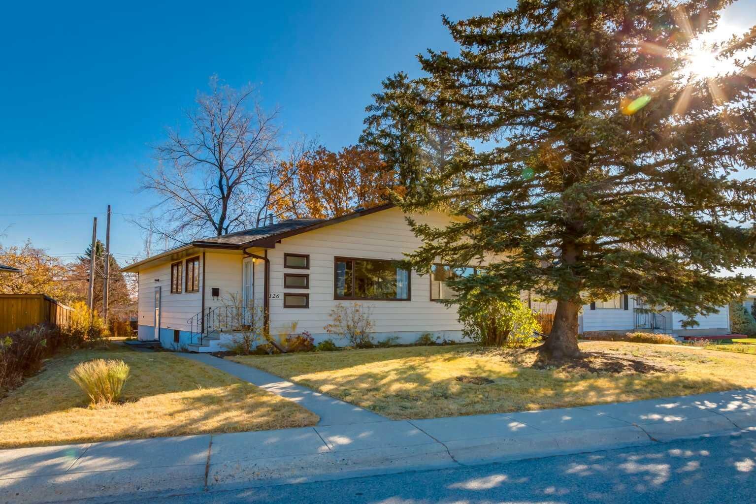 Property Photo:  126 &Amp 128 Winston Drive SW  AB T3C 2P9 