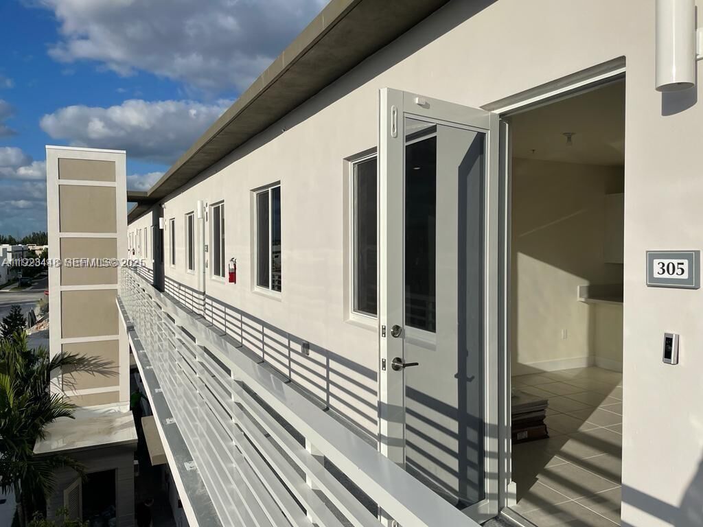 Property Photo: 6453 NW 102nd Path 305 FL 33178