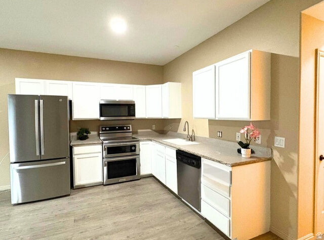 Property Photo:  2402 S Black Village Ct W  UT 84119 