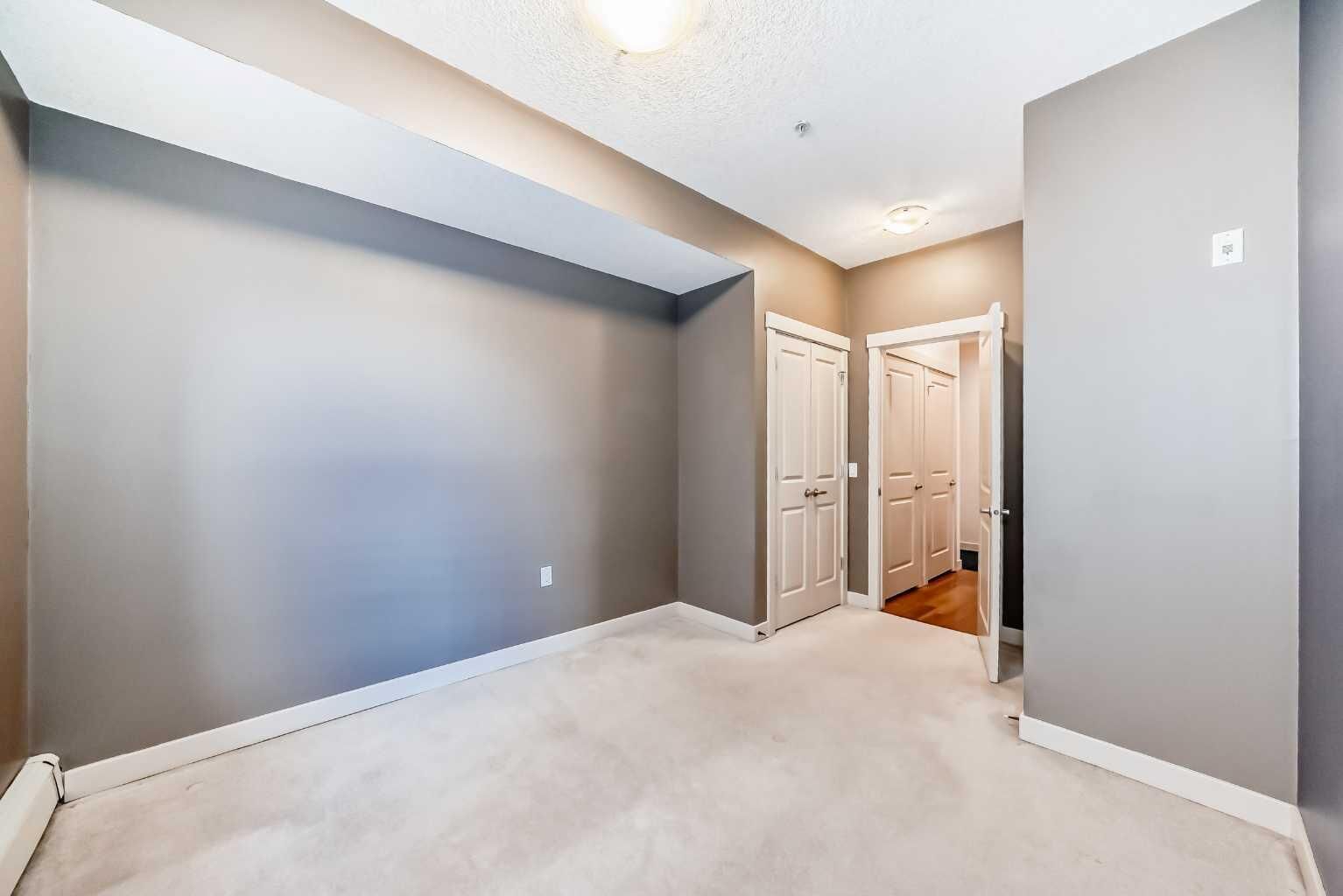 Property Photo:  4704 Stanley Road SW 103  AB T2S 2R2 