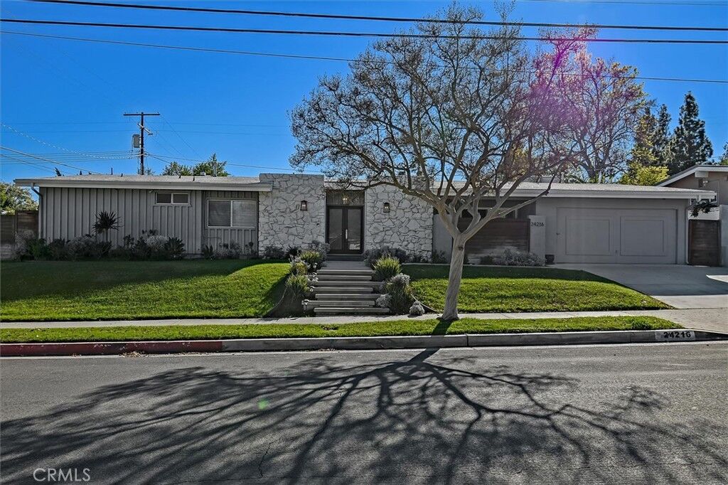 Property Photo: 24216 Calvert Street CA 91367