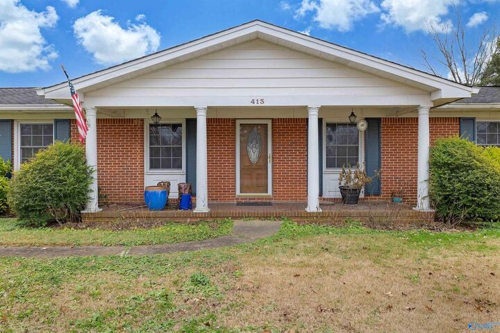 Property Photo:  413 Apple Avenue  AL 35950 