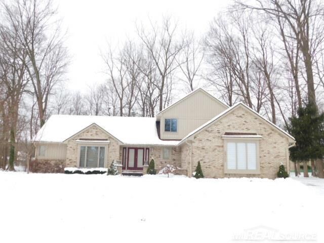 Property Photo: 48515 Hidden Oaks Lane MI 48317