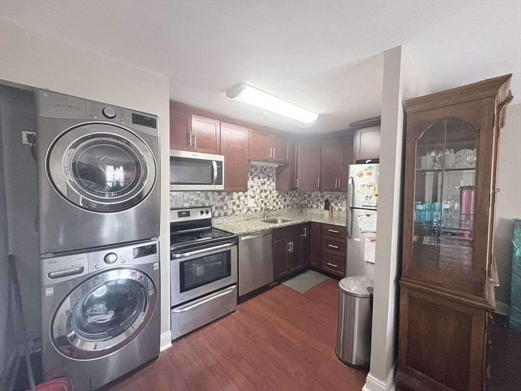 Property Photo:  75-77 Colonel Bell Dr. 77-11  MA 02301 