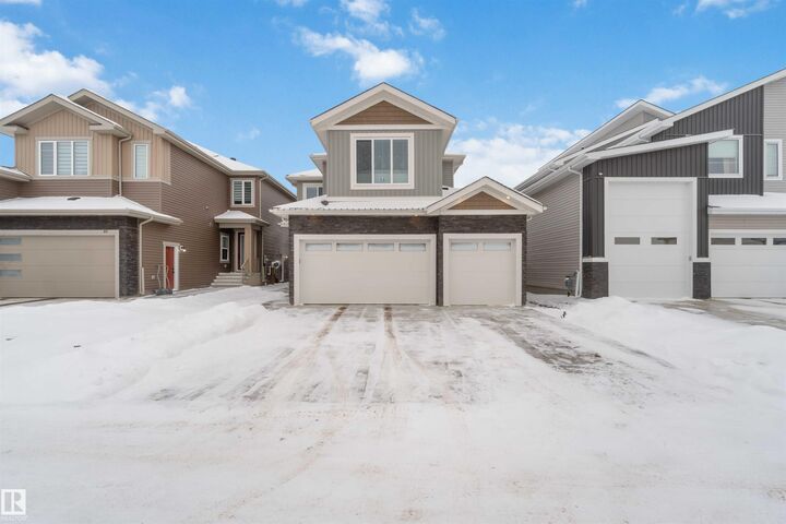 Property Photo:  53 Deer Meadow Crescent  AB T8L 1Y4 
