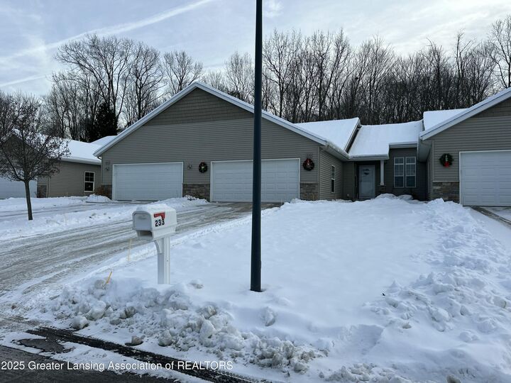 Property Photo:  233 Barrington Circle  MI 48917 