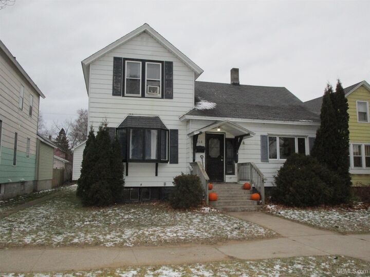 Property Photo: 308/310 S 12th Street MI 49829