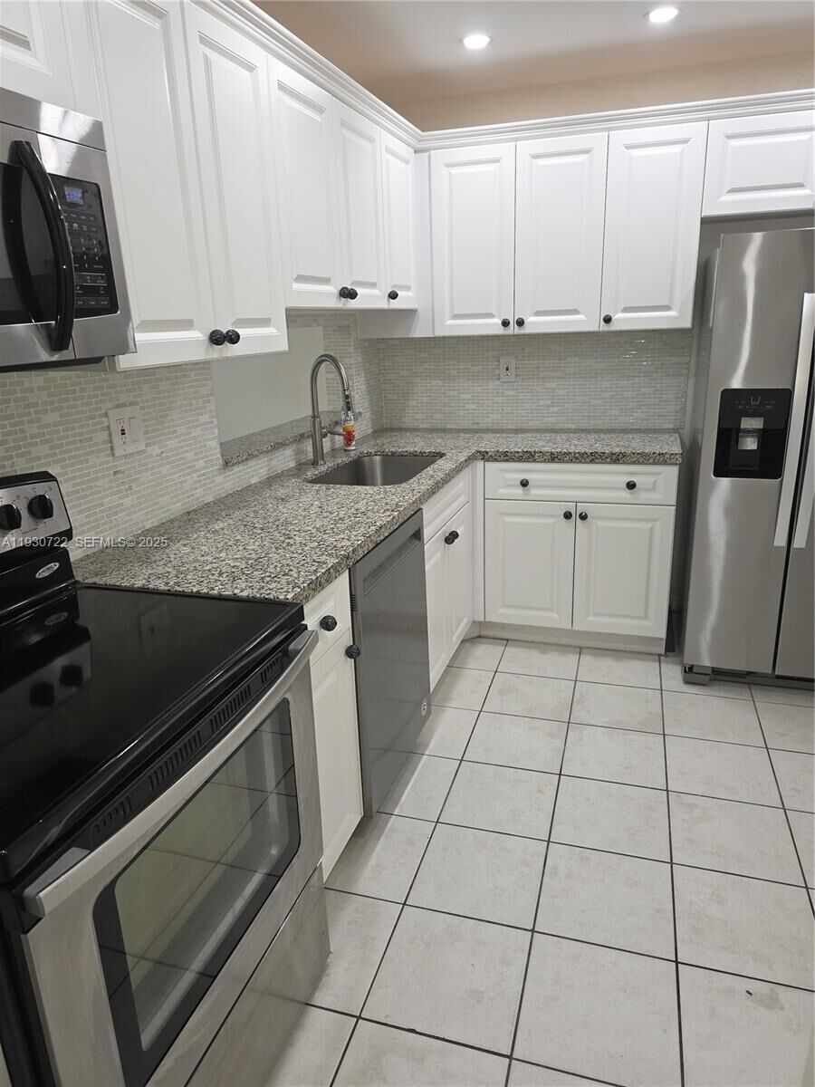 Property Photo:  8075 SW 107 Av 210  FL 33173 