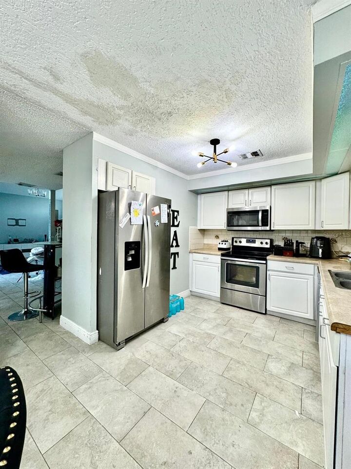 Property Photo: 104 Green Cove Court FL 34743