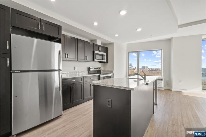 Property Photo:  69 Main Street 1511  NJ 07024 